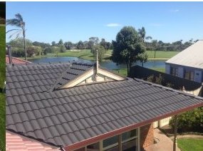 Restored tile roof — lakeside home